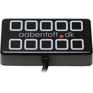 A black rectangular device with 10 buttons outlined in white and a cord at the bottom.