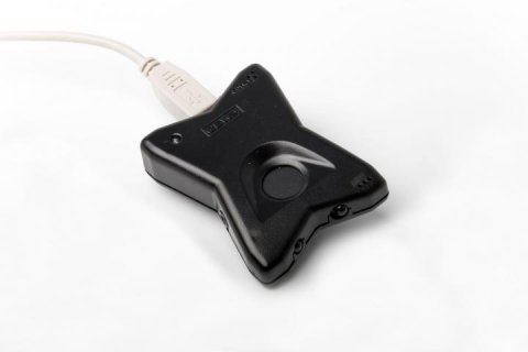 A black star-shaped device with a white cord.