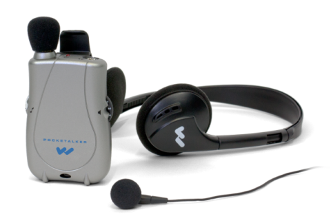 Handheld, light gray device with a microphone protruding out of the top left of the unit, a headphone lying flat next to it, and an earbud with a cord in front of it.