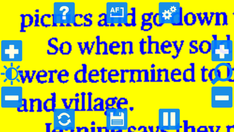 Blue text magnified on a yellow background and menu options around the edges of the screen.
