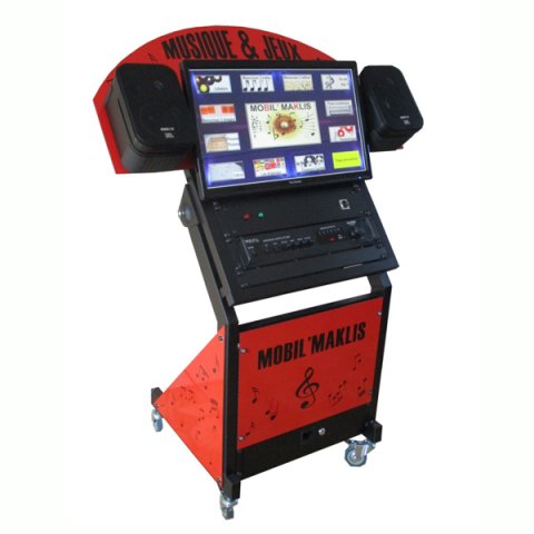 A red podium on wheels with a large table at the top, in between two speakers and above a control panel..