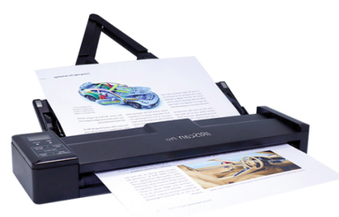 A black rectangular scanner with a page being fed through and half-way on the triangular paper support arm. The operating buttons are on the left side.