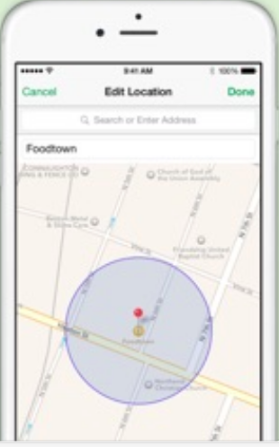 A map on an iPhone with a red pinpoint as the center of a highlighted circle about 2 blocks in diameter.