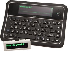 Keyboard with display screen above it and a small handheld display placed in front of it.