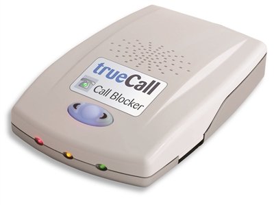 Small, flat, rectangular device with three blinking lights on frontside. 