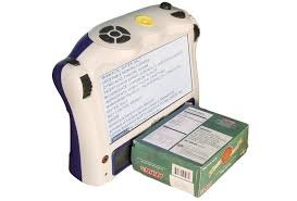 Large tablet-like device with an LCD screen, displaying packaged food instructions.