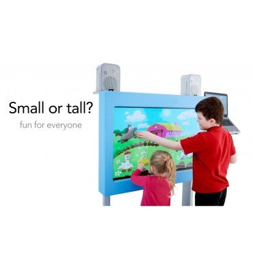 Two kids using a large touchscreen device that has a scene with a duck, green grass, and blue skies.