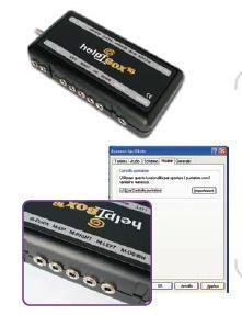 Rectangular black device with close up of switch inputs and program dialog box.