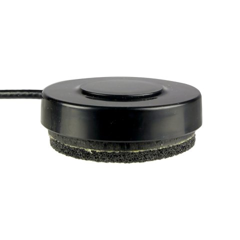 Circular black switch, with a small raised target area at the top.