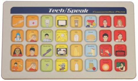 A white and blue rectangular device with 32 message icons with text above such as "milk" and hungry," and a handle on the top.