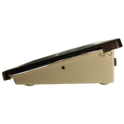 Side view with beige tabletop wedge underneath black overlay.