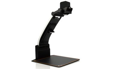Camera mounted to long bendable mount, with a platform base beneath for placing print materials.