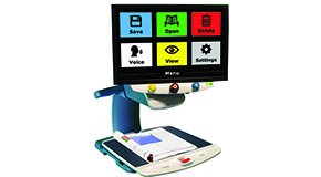 Rectangular display with colorful grid of menu options attached to a reading table/scanner.