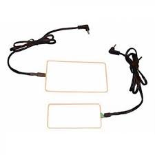 Two transparent rectangular looking switches; black wire attached to each switch, which has standard jack