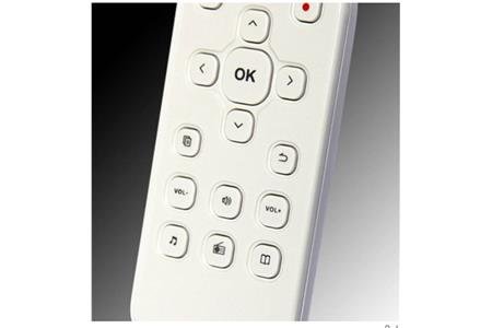 White device with directional and ok buttons, record button. 