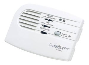Device with speaker and sliding volume,tone, and ring pattern control buttons.