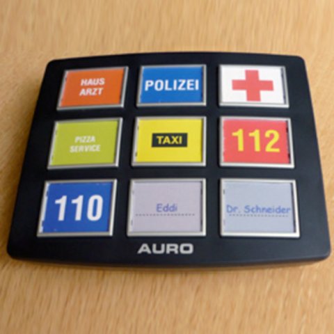 Square device with nine quick dial buttons.