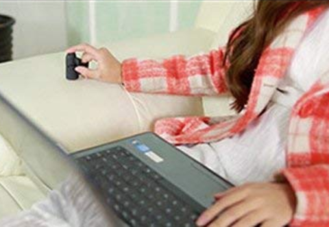 Finger mouse being used on non-traditional surfaces in lieu of mouse pad.
