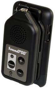Rectangular device with volume controls connected to the back of a smartphone.