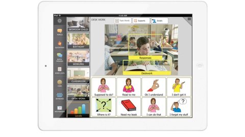 Screen shot with grid of communications symbols across bottom and picture of child at a desk in top right.