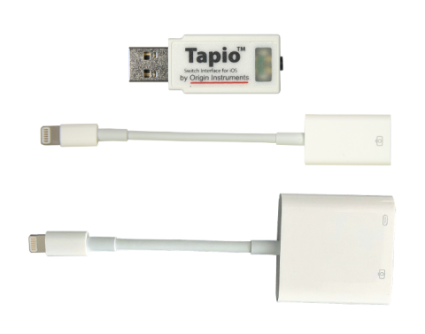 White USB with Lightning adapter cable beneath and an additional Lightning adapter with charging port.