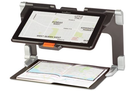 Collapsible video magnifier with tray for text material and extended tray for camera to display the zoomed text on screen.