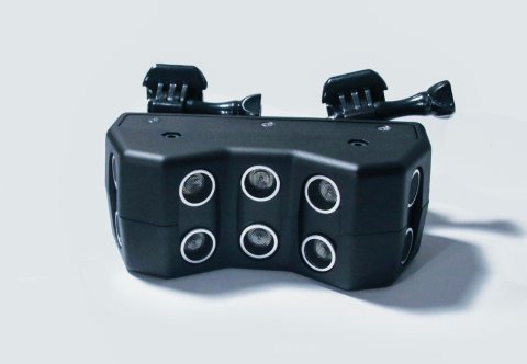 Black polygonal shaped device with six camera lenses and mounting device.