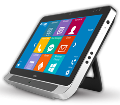Black, rectangular tablet displaying a home screen with various app icons. The device features a built-in kickstand and an eye-tracking sensor bar at the bottom front edge.