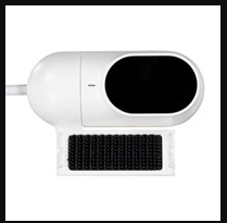  A capsule-shaped device in a landscape position that sits atop a rectangular mount. It is white with a cord at one end, an LED indicator in the middle and about half of it consists of a large black oval screen on the other end. The mount is white with a black rectangle.