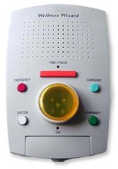 White rectangular device with speaker on top and large yellow lighted button in center on the bottom half surrounded by two small colored buttons on either side.