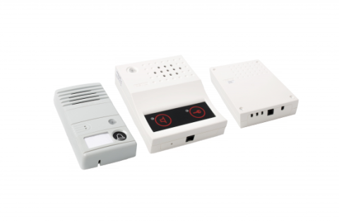 Three white-colored rectangular boxes with built-in speakers and input connections.