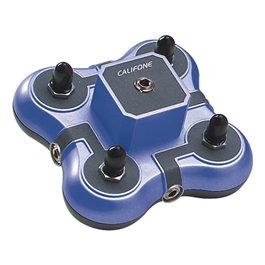 Slightly-curved, rectangular box with four input jacks for headphones at each corner. In the center, there is a raised portion with a fifth kind of input jack. The device is blue in color.