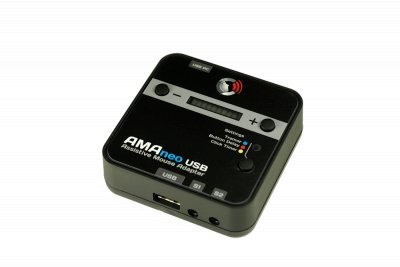 Small, square black device with small LCD display and control buttons on face and three port connections on side.