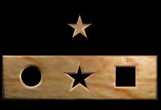 Black rectangular shape with a wood-like puzzle bar across the bottom with three openings for a star, a circle, and a square, and a matching star puzzle piece on top.