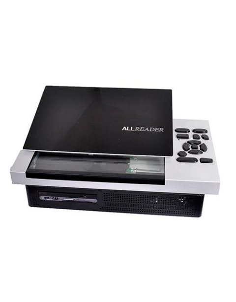 A black and silver machine resembling a scanner, with a long and narrow LCD display panel and several black menu buttons on the top.