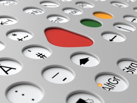 Close-up of white keys and gray casing