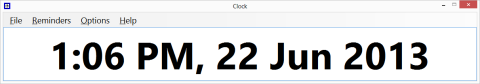 Long, narrow rectangular popup window with time and date displayed in large type.