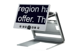 Flat display showing large letters on the screen attached to a folding arm and connected to a silver-colored flat surface with a piece of paper on it.