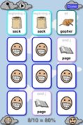 Screenshot of a 4x3 grid of flashcards, some with the backs showing a smiling face with teeth, and others turned over revealing an image and a word for each.