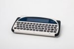 A white keyboard with gray keys and a blue screen above the keys.