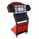 A red podium on wheels with a large table at the top, in between two speakers and above a control panel..