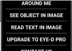 A partial screen of an iPhone. It has a black background with white text: Around Me, See Object in Image, Read Text in Image, Upgrade to Eye-D Pro, and Contact Us.