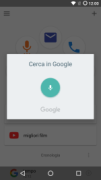 Voice Search screen featuring the Google microphone icon.