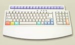 Compact keyboard with number pad and color-coded keys.