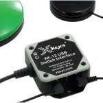 Small, square, wired device connected to two switches. 