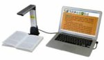 Fixed camera above a book with the text and image magnified on a connected laptop screen.