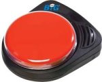 A palm sized black device with big red button on it. There is a small speaker at top right corner of the device.