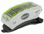 Small beige recording device sown on top a wearable wrist strap.
