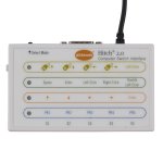 Small, rectangular, wired device with a diagram explaining use and ports on its side.
