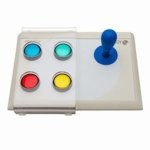 White rectangular device with four colored buttons on left side and blue joystick on right side.
